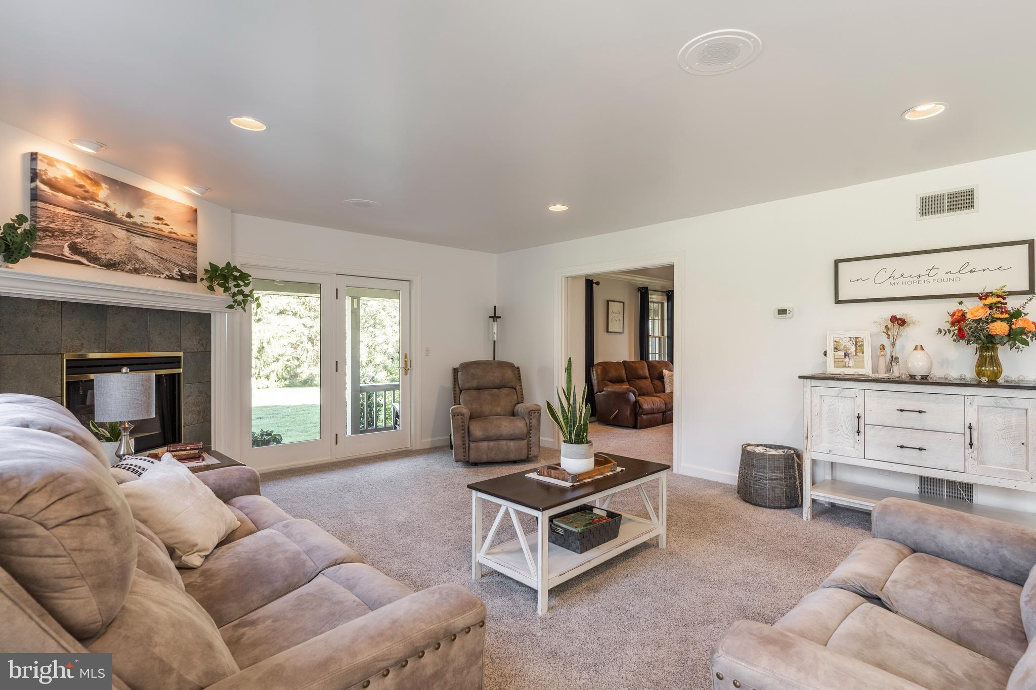 3020 Meadow View Road Manheim, PA 17545 - Photo 41 of 108 a living room with furniture a window and a flat screen tv