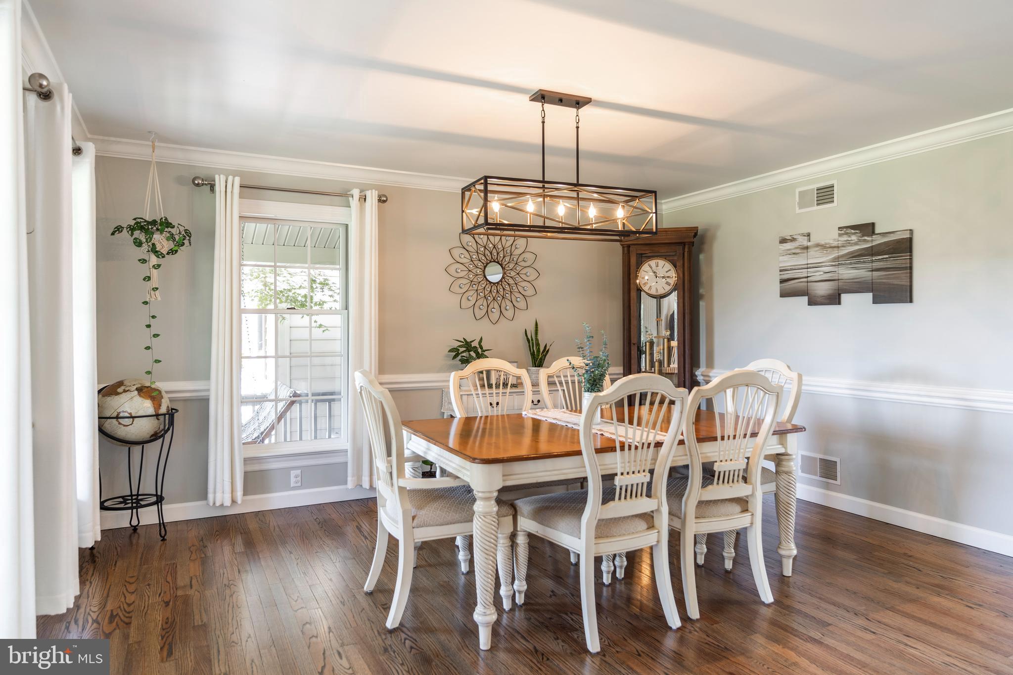 3020 Meadow View Road Manheim, PA 17545 - Photo 56 of 108 a view of a dining room with furniture wooden floor and chandelier