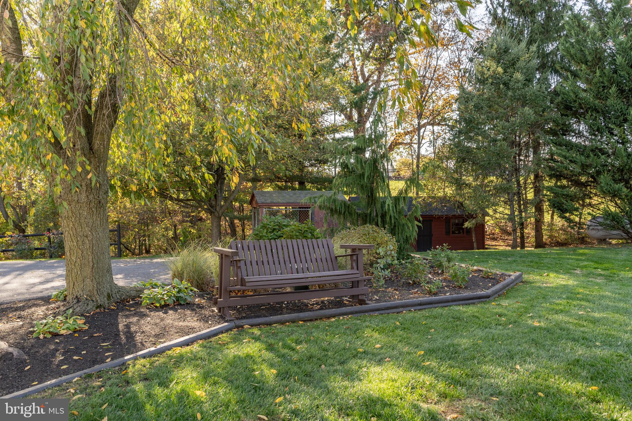 3020 Meadow View Road Manheim, PA 17545 - Photo 65 of 108 a view of backyard with table and chairs plants and trees