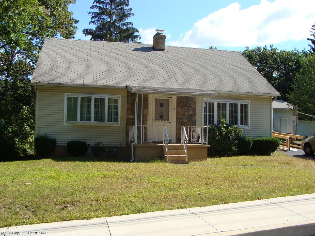 1571 East Mountain Road Scranton, PA 18505 - Photo 1 of 8 a front view of a house with a yard