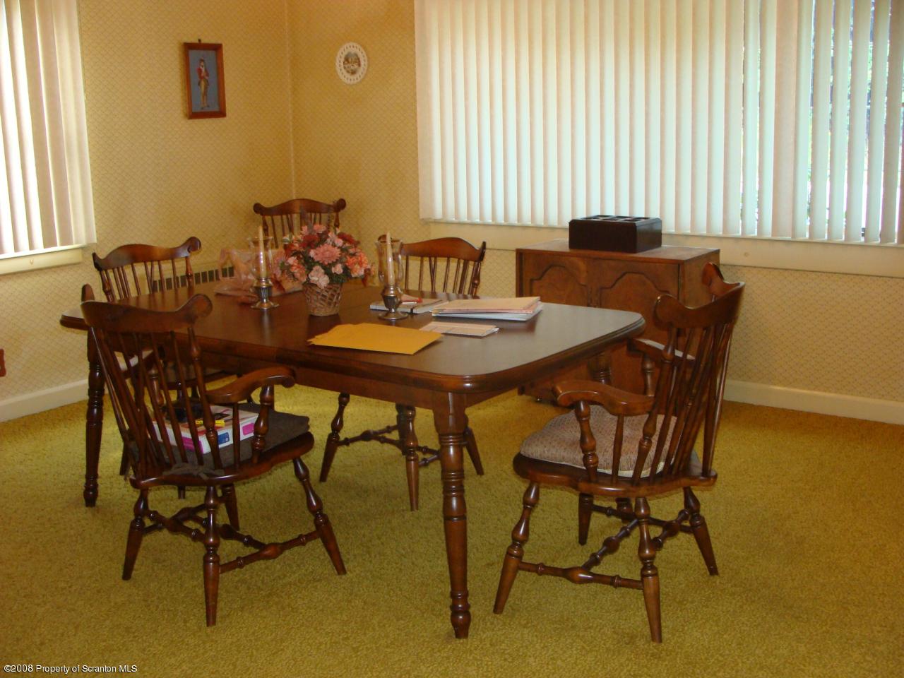 1571 East Mountain Road Scranton, PA 18505 - Photo 5 of 8 a view of a dining room with furniture and a window