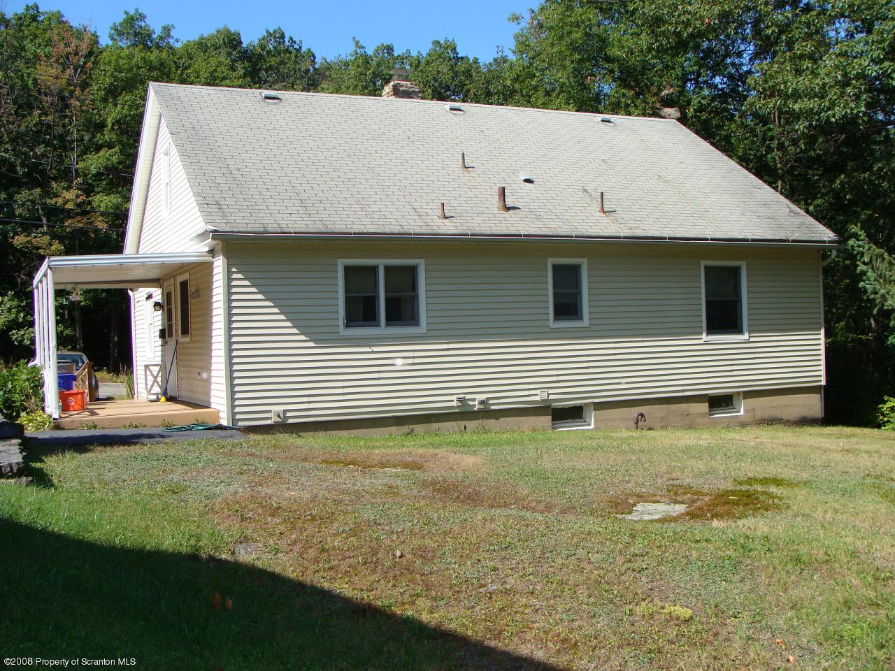 1571 East Mountain Road Scranton, PA 18505 - Photo 7 of 8 a view of a house with backyard and garden