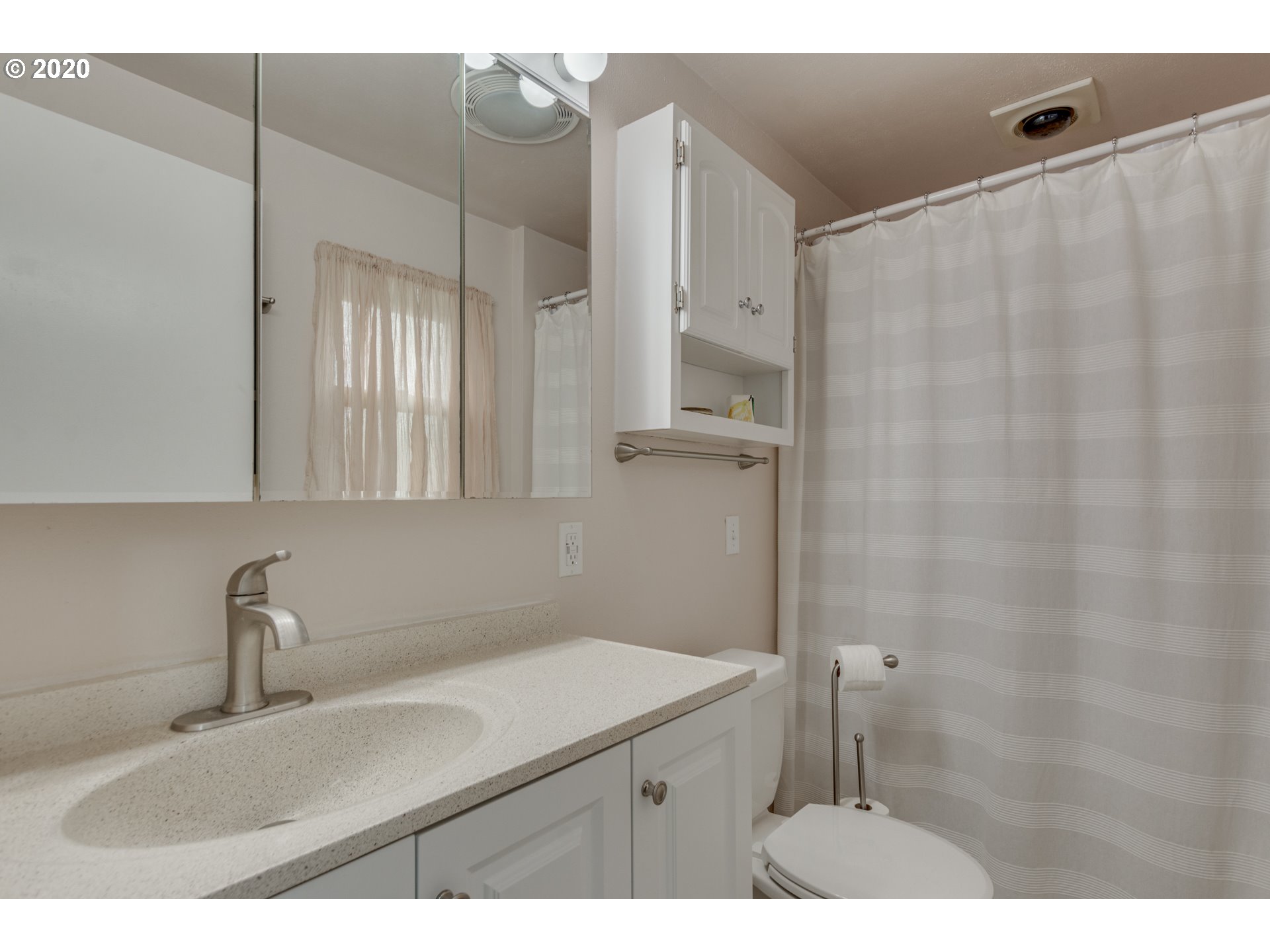 1650 North Royle Road Ridgefield, WA 98642 - Photo 16 of 32 a bathroom with a sink and a mirror