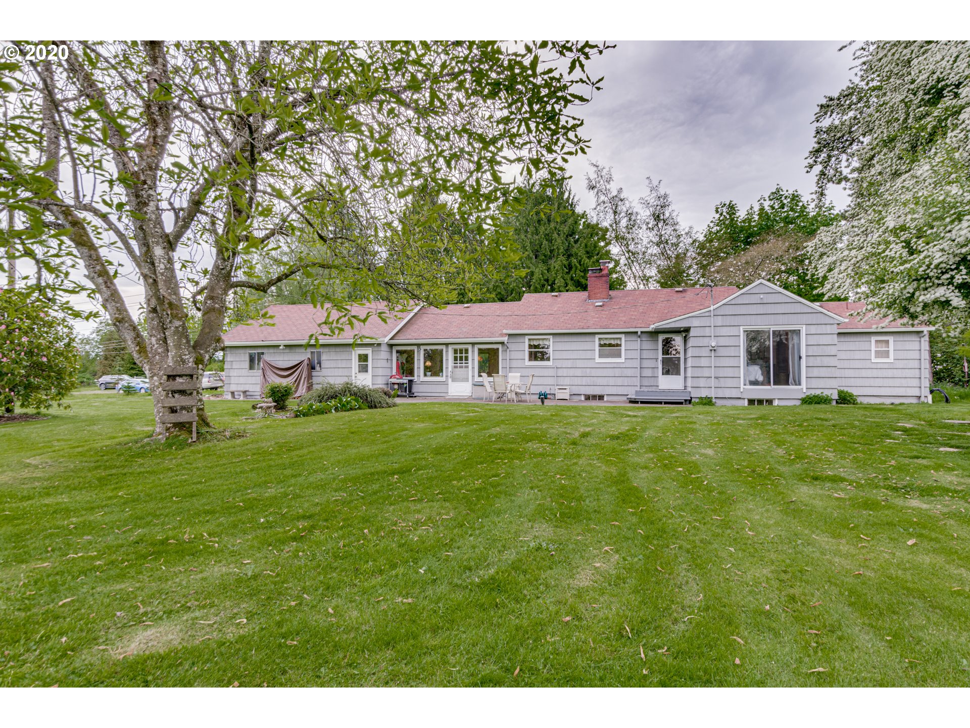 1650 North Royle Road Ridgefield, WA 98642 - Photo 19 of 32 a front view of a house with a garden