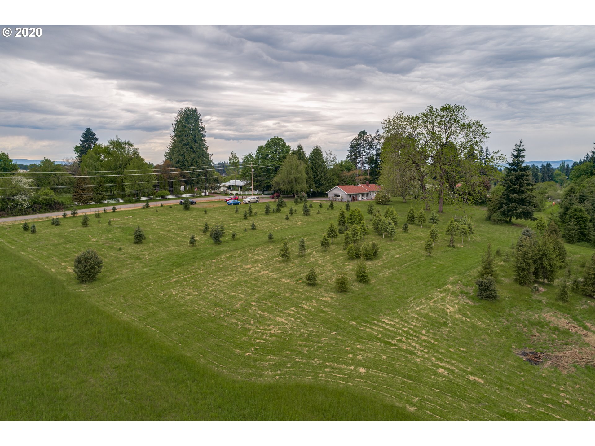 1650 North Royle Road Ridgefield, WA 98642 - Photo 25 of 32 a view of a lake with houses in the back