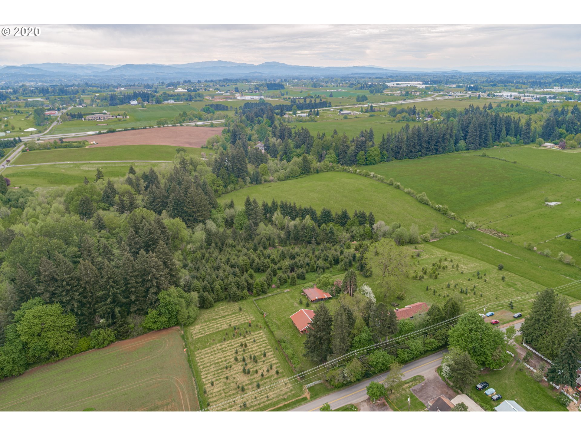 1650 North Royle Road Ridgefield, WA 98642 - Photo 32 of 32 a view of a lush green hillside and houses