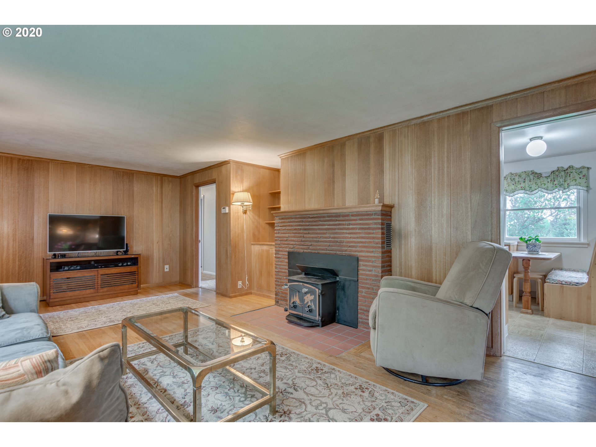 1650 North Royle Road Ridgefield, WA 98642 - Photo 6 of 32 a living room with furniture and a fireplace