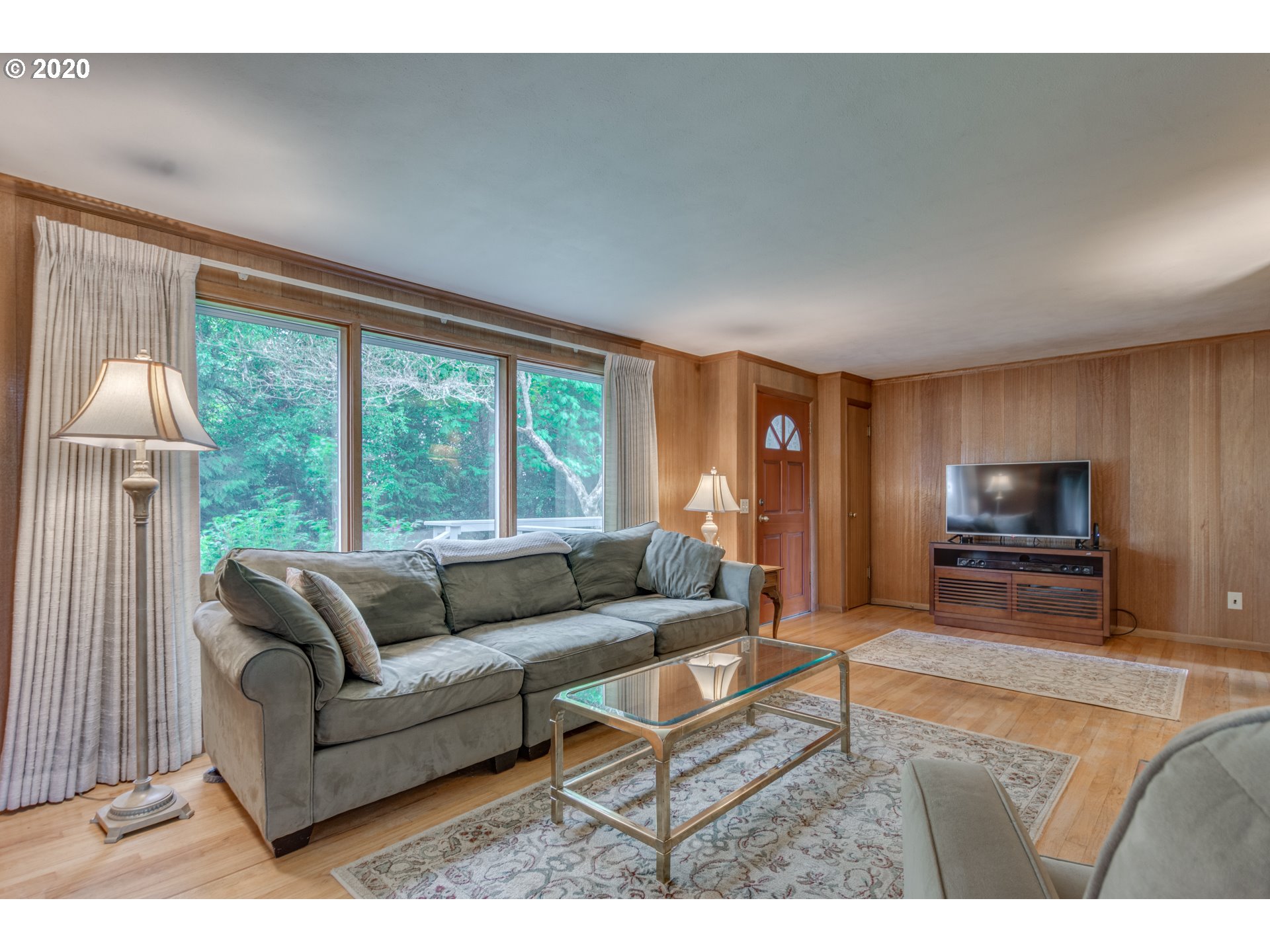 1650 North Royle Road Ridgefield, WA 98642 - Photo 7 of 32 a living room with furniture and a flat screen tv