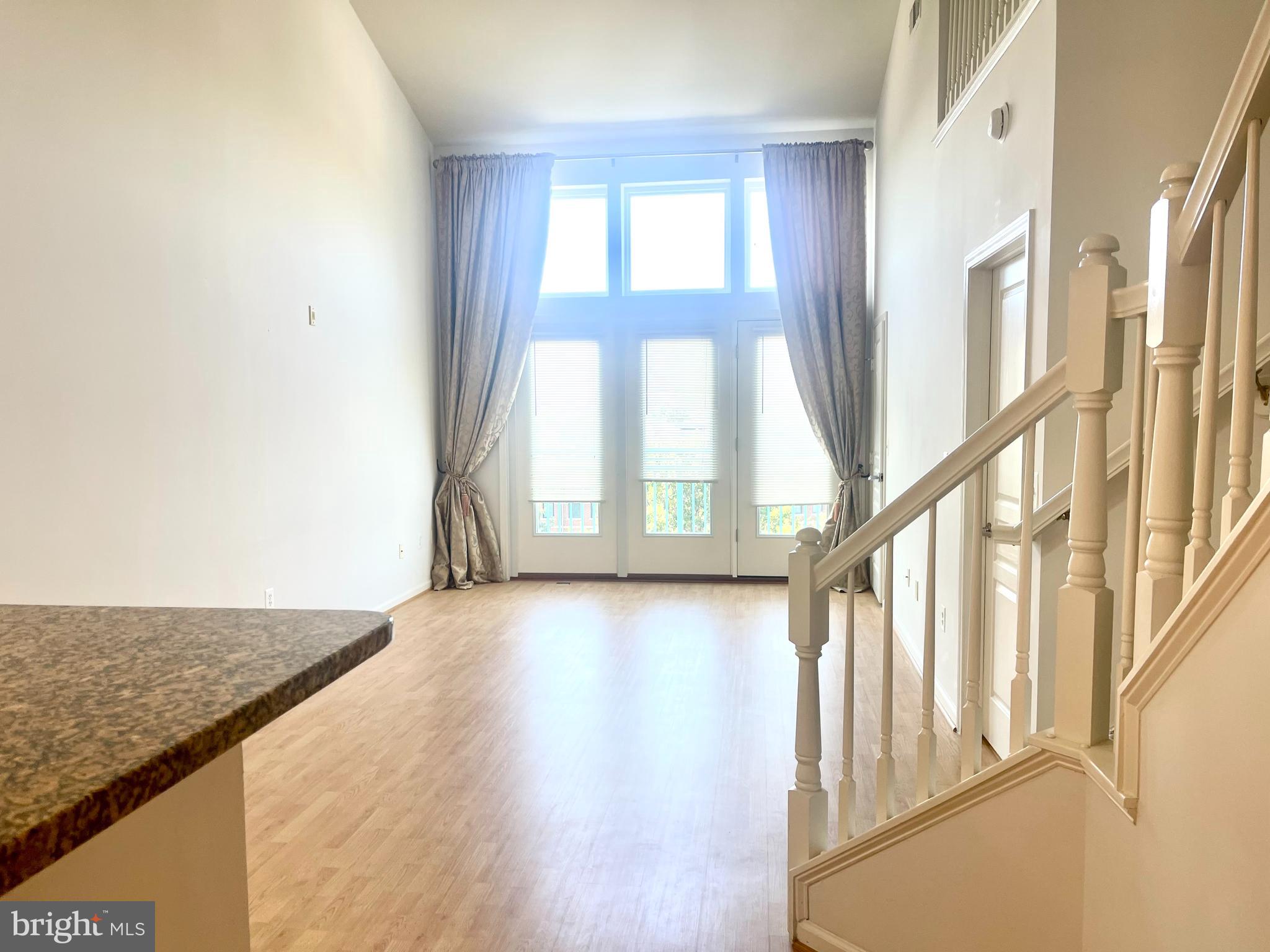 12000 Market Street, Unit 478 Reston, VA 20190 - Photo 7 of 15 To Living Room