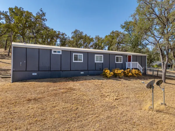 a house view with a garden space