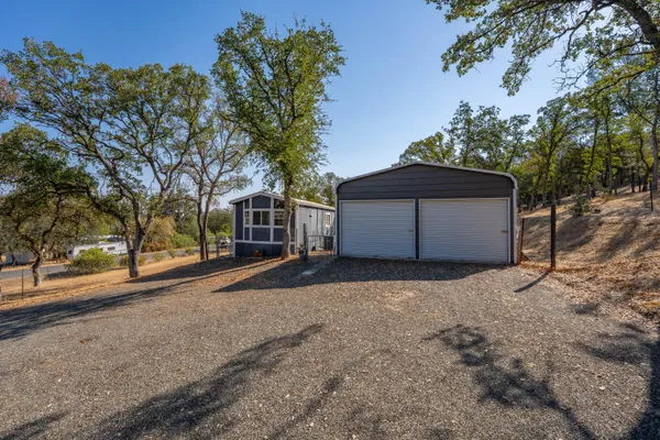 a house with trees in front of it