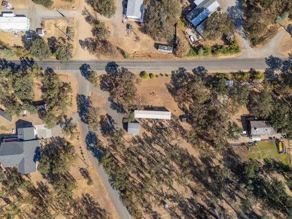 an aerial view of beach and residential building