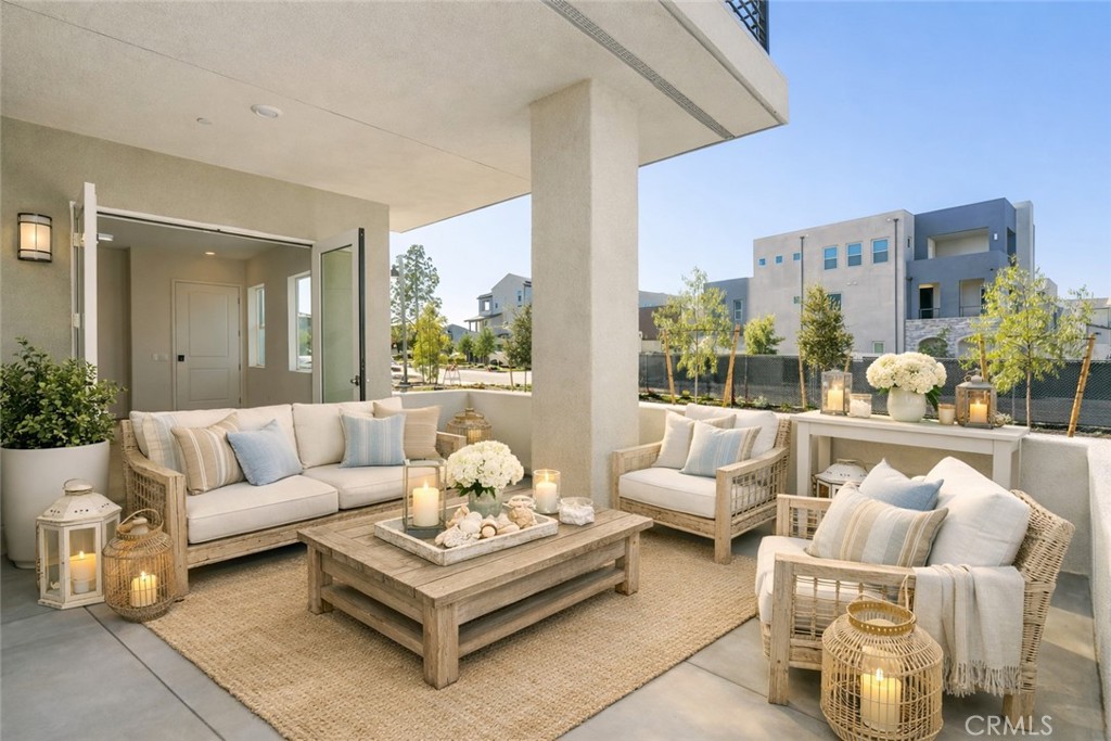 121 Baluster Irvine, CA 92618 - Photo 24 of 80 a living room with furniture potted plant and a large window