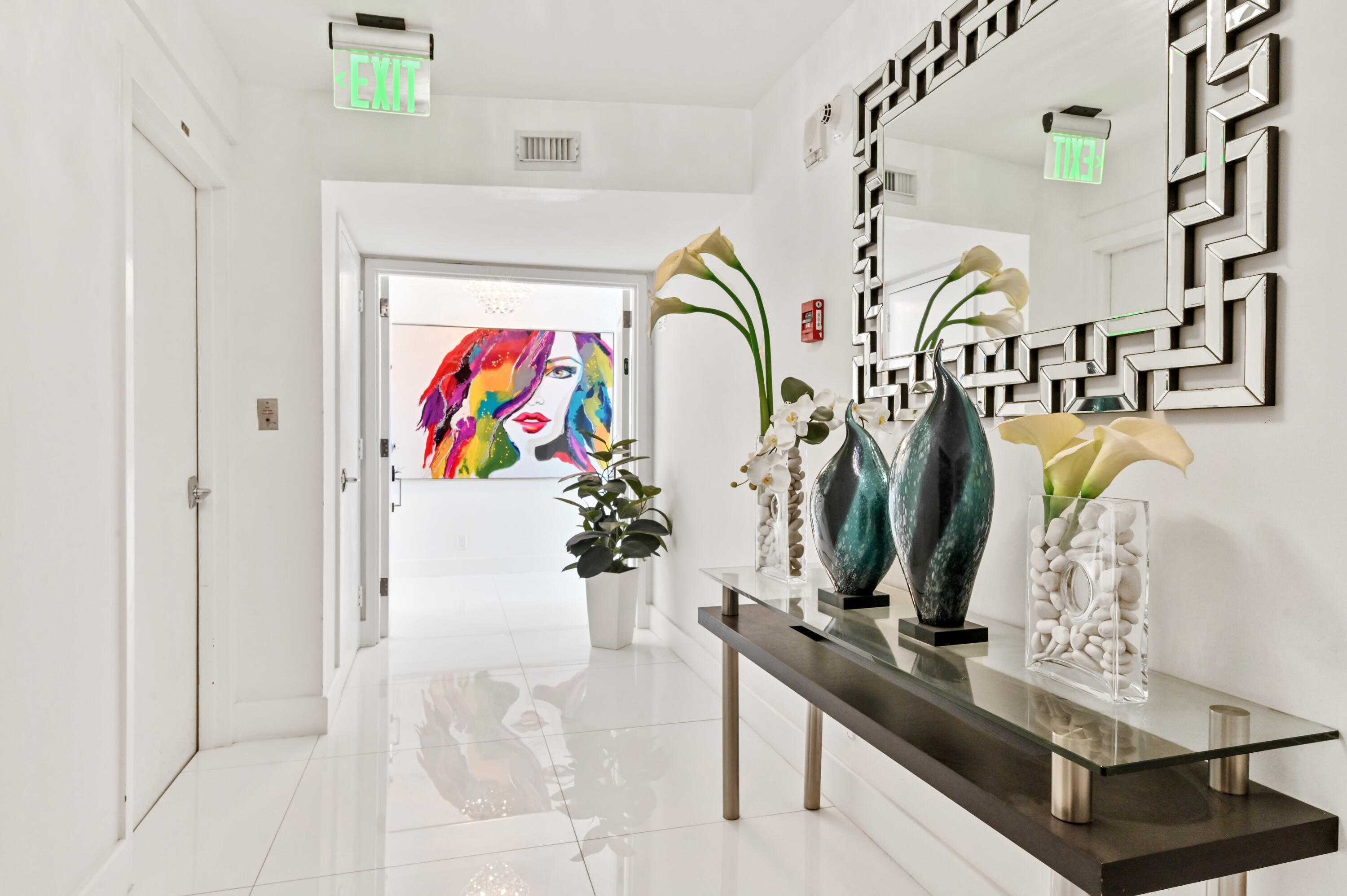 2800 South Ocean Boulevard, Unit 21E Boca Raton, FL 33432 - Photo 3 of 60 a view of walk in closet with clothes and shoes