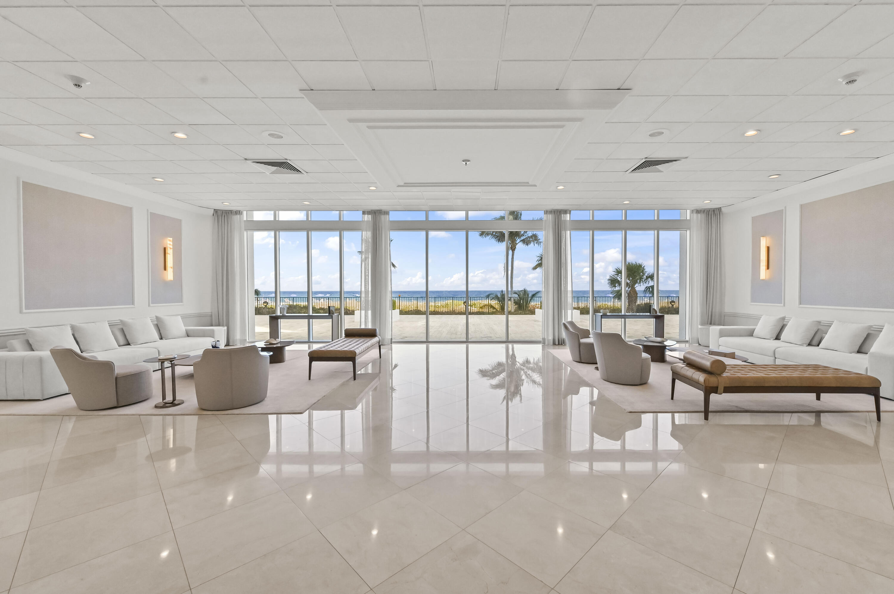 2800 South Ocean Boulevard, Unit 21E Boca Raton, FL 33432 - Photo 39 of 60 a living room with lots of furniture and a large window