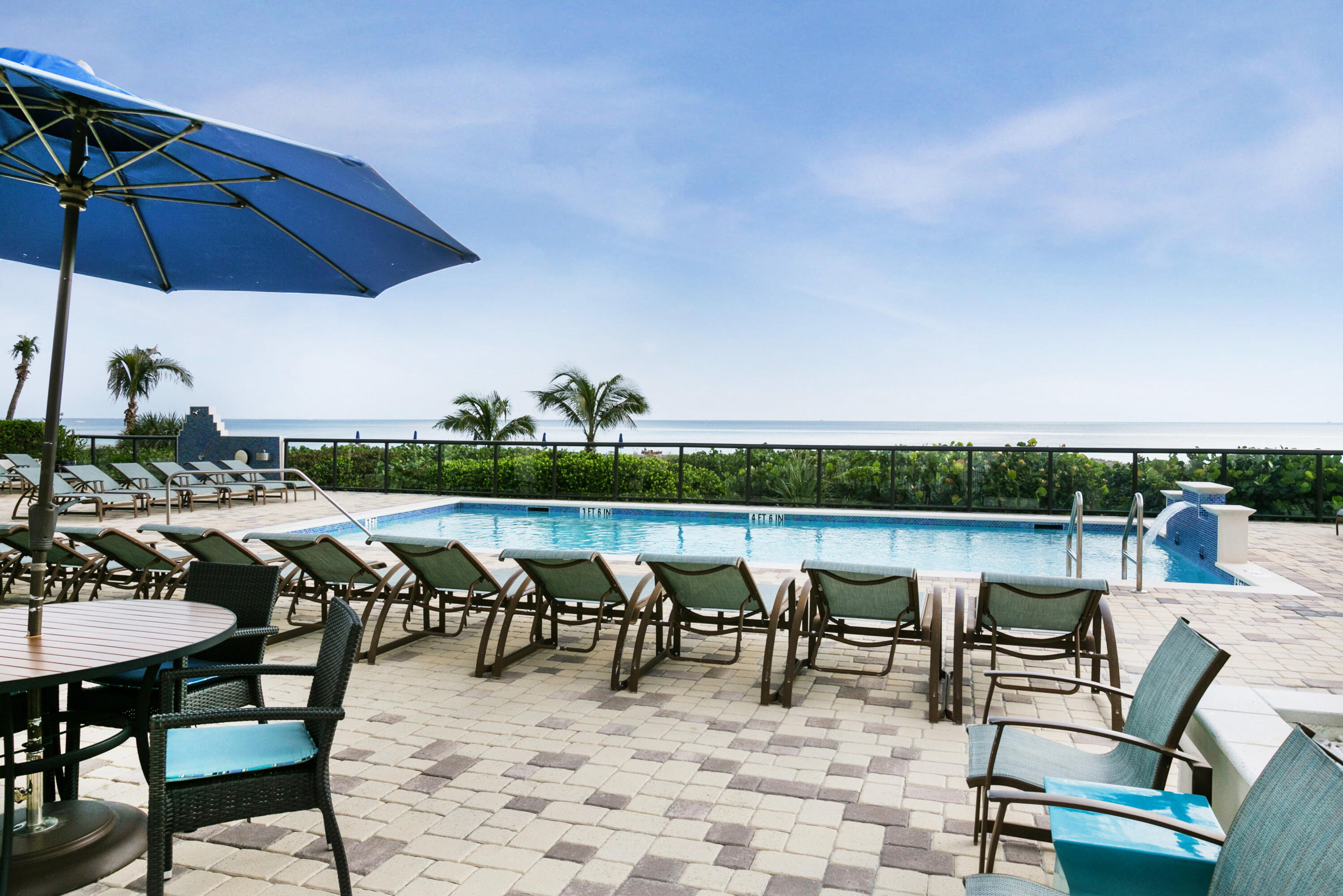 2800 South Ocean Boulevard, Unit 21E Boca Raton, FL 33432 - Photo 56 of 60 a view of a chairs and table in patio