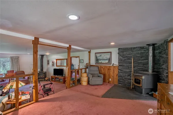a view of a livingroom with furniture window and outside view