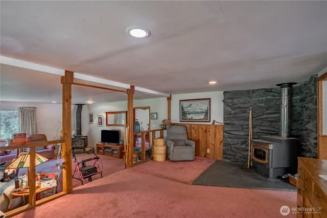 a view of a livingroom with furniture window and outside view