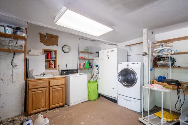 a bedroom with a bed and a desk