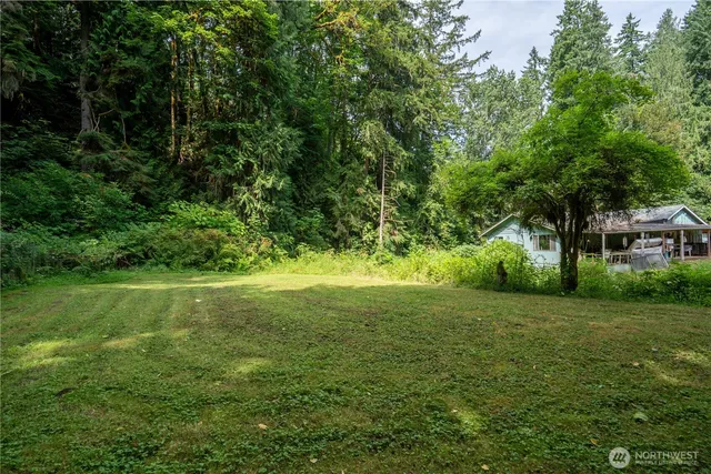 a view of outdoor space with deck and garden