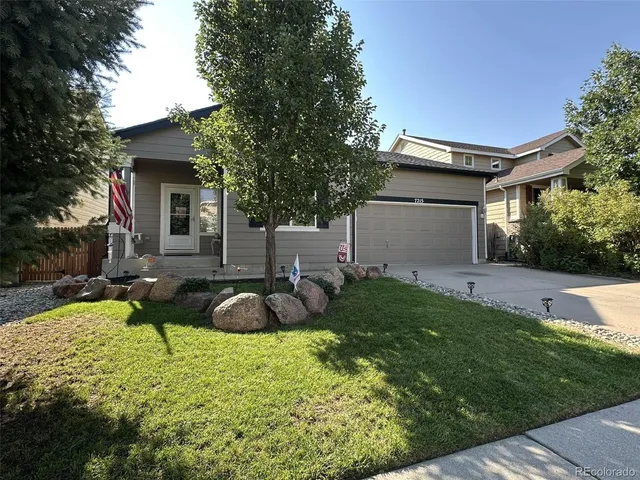 a backyard of a house with seating space