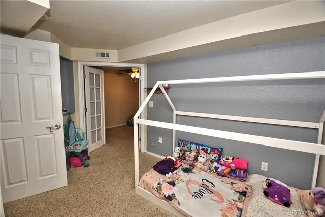 a room with lots of furniture and windows