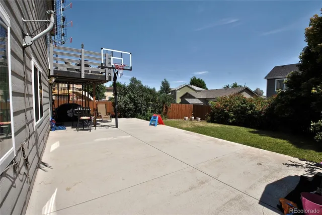 a view of backyard with garden and plants