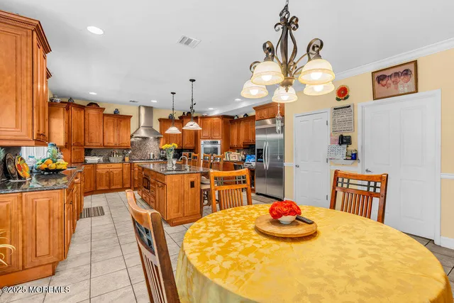 a bathroom with a sink double vanity and a mirror