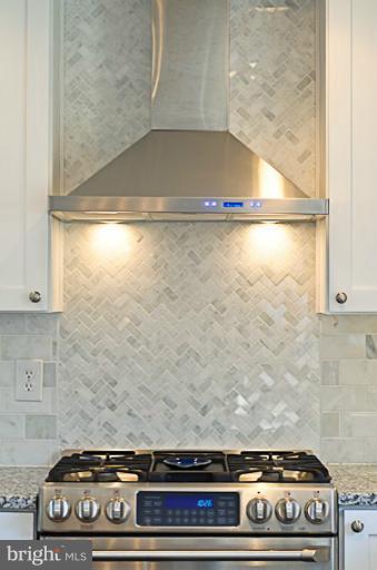8469 Roberts Road Ellicott City, MD 21043 - Photo 23 of 30 Herringbone pattern tile backsplash