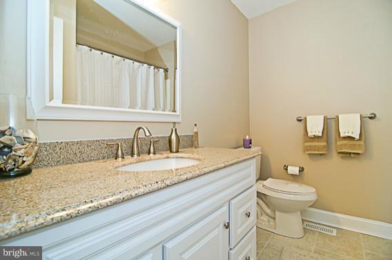8469 Roberts Road Ellicott City, MD 21043 - Photo 5 of 30 Remodeled hall bathroom