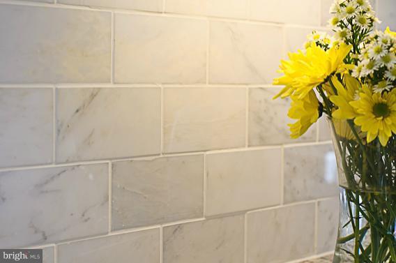 8469 Roberts Road Ellicott City, MD 21043 - Photo 7 of 30 Carrara polished marble tile backsplash
