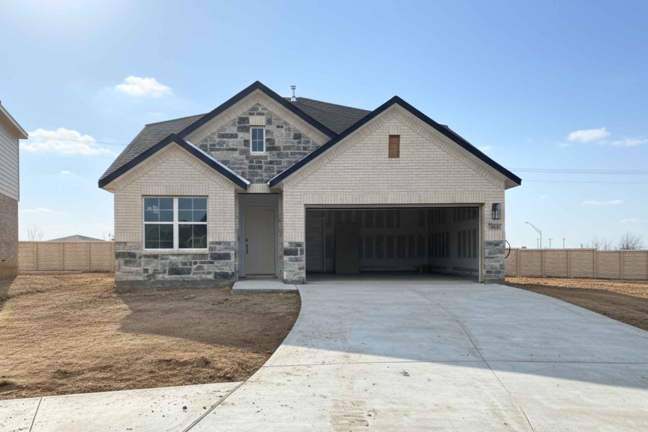 25624 Wheat Seed Lane Elgin, TX 78621 - Photo 1 of 40 View of front of property featuring stone siding, concrete driveway, an attached garage, and brick siding