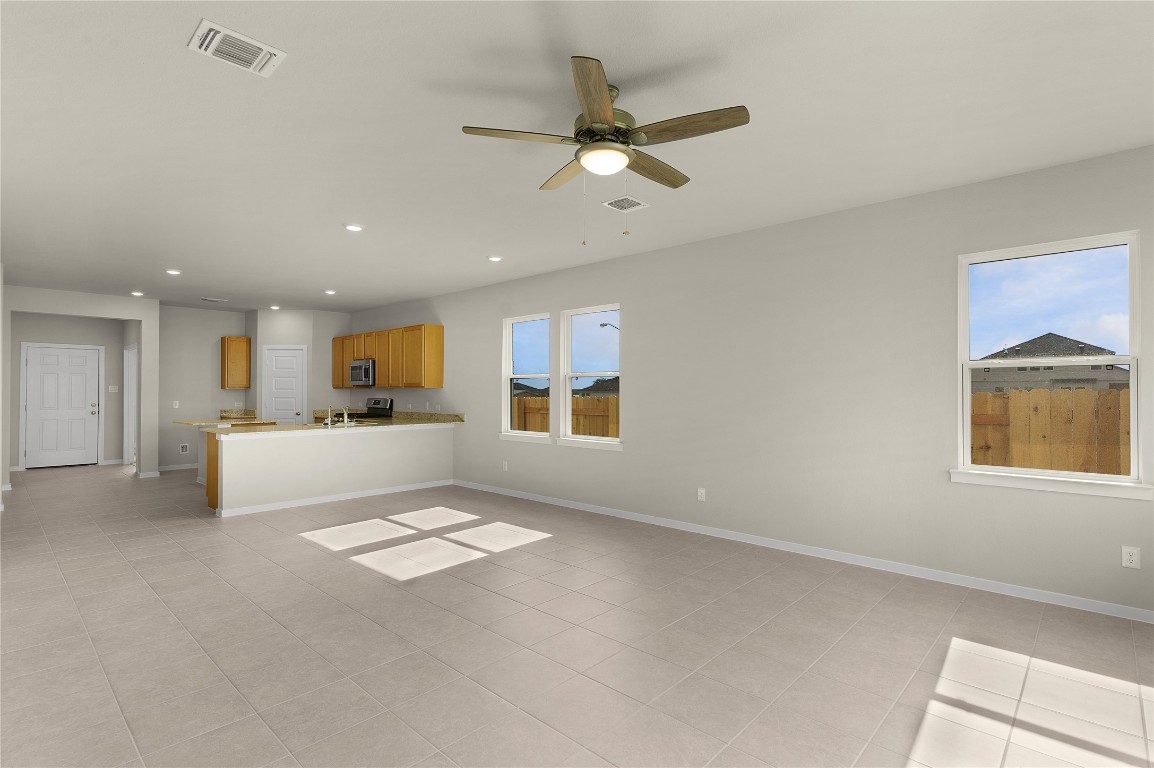 25624 Wheat Seed Lane Elgin, TX 78621 - Photo 21 of 40 a view of an empty room with a window