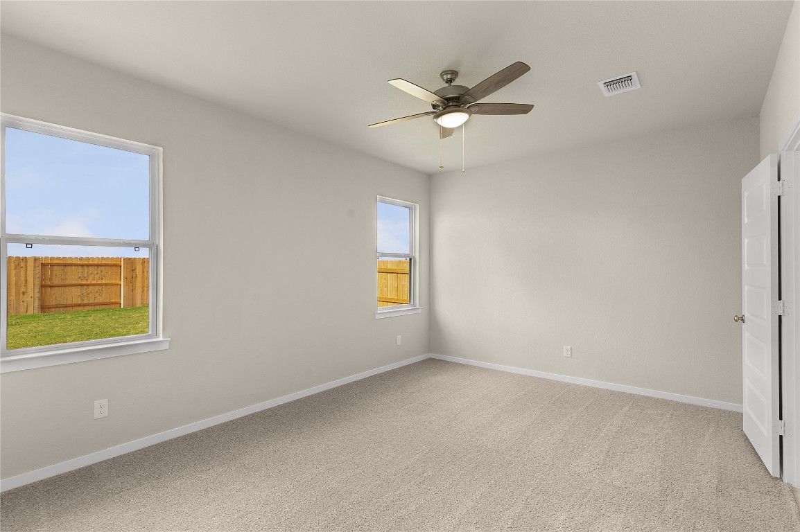 25624 Wheat Seed Lane Elgin, TX 78621 - Photo 24 of 40 a view of an empty room with a window