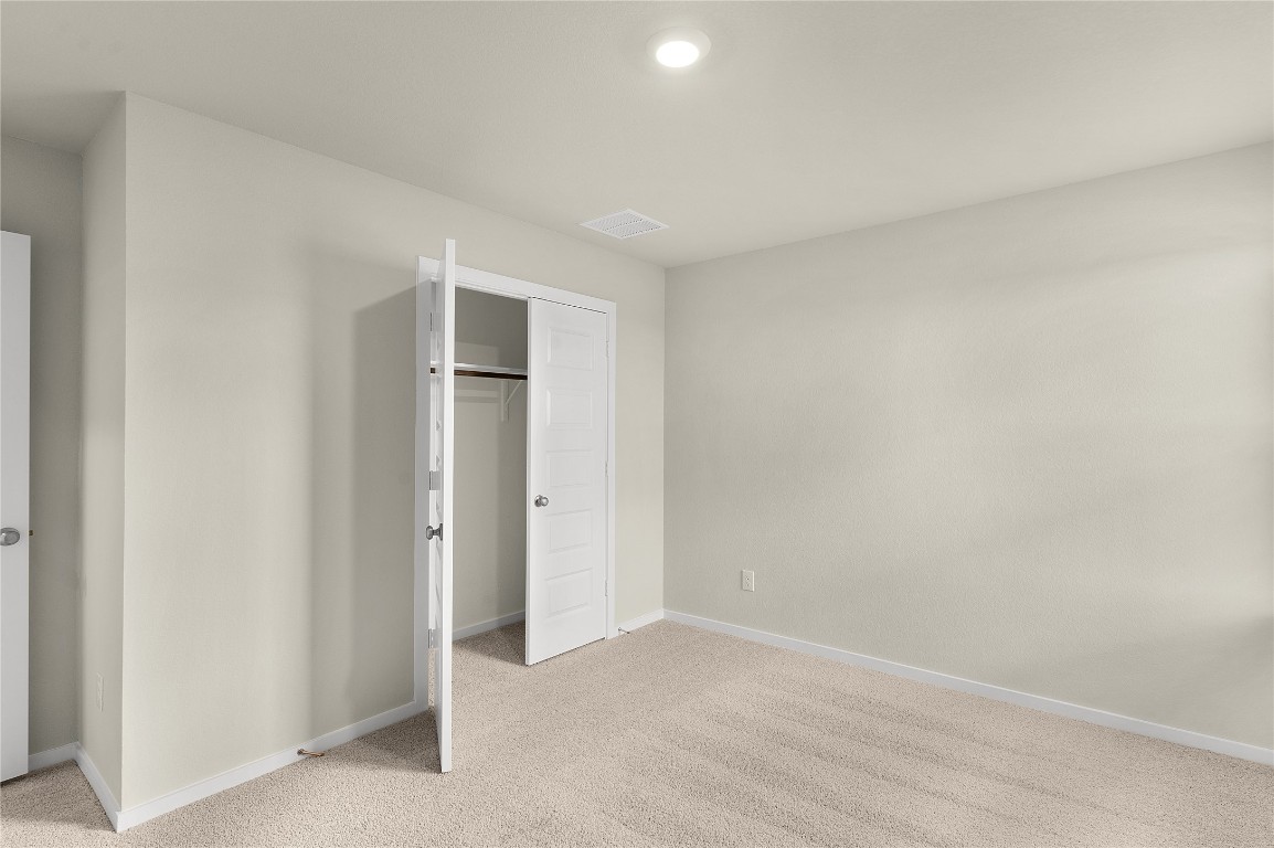 25624 Wheat Seed Lane Elgin, TX 78621 - Photo 34 of 40 a view of an empty room