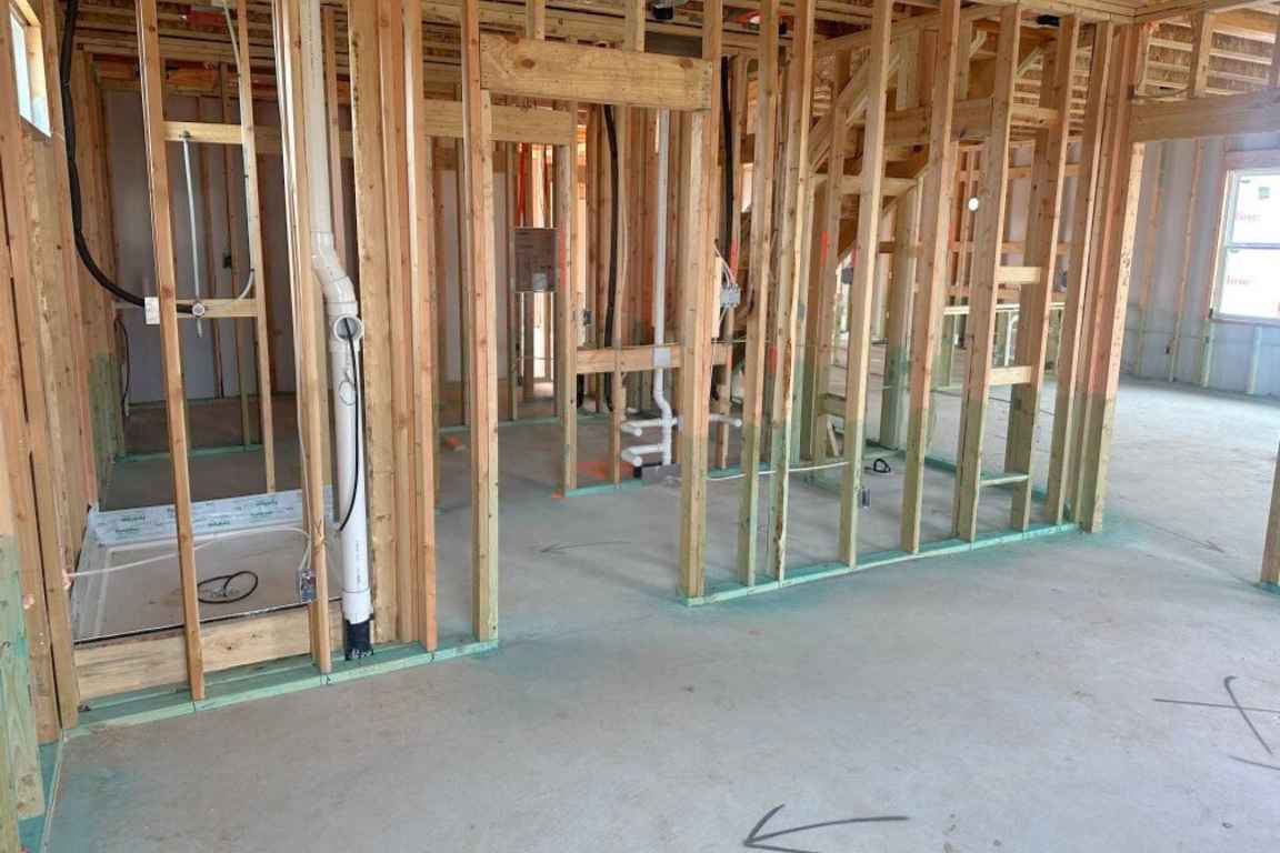 25624 Wheat Seed Lane Elgin, TX 78621 - Photo 3 of 40 a view of a room with floor to ceiling window