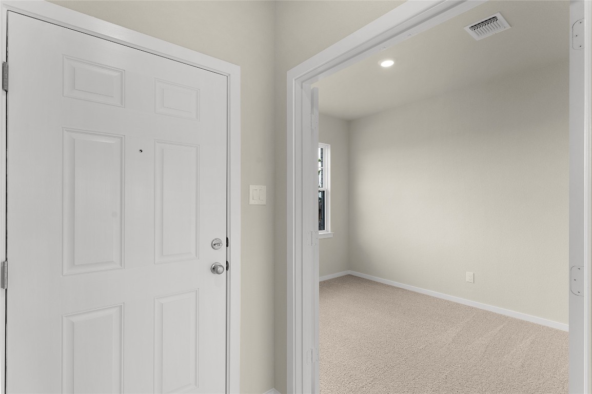 25624 Wheat Seed Lane Elgin, TX 78621 - Photo 16 of 40 a view of an empty room