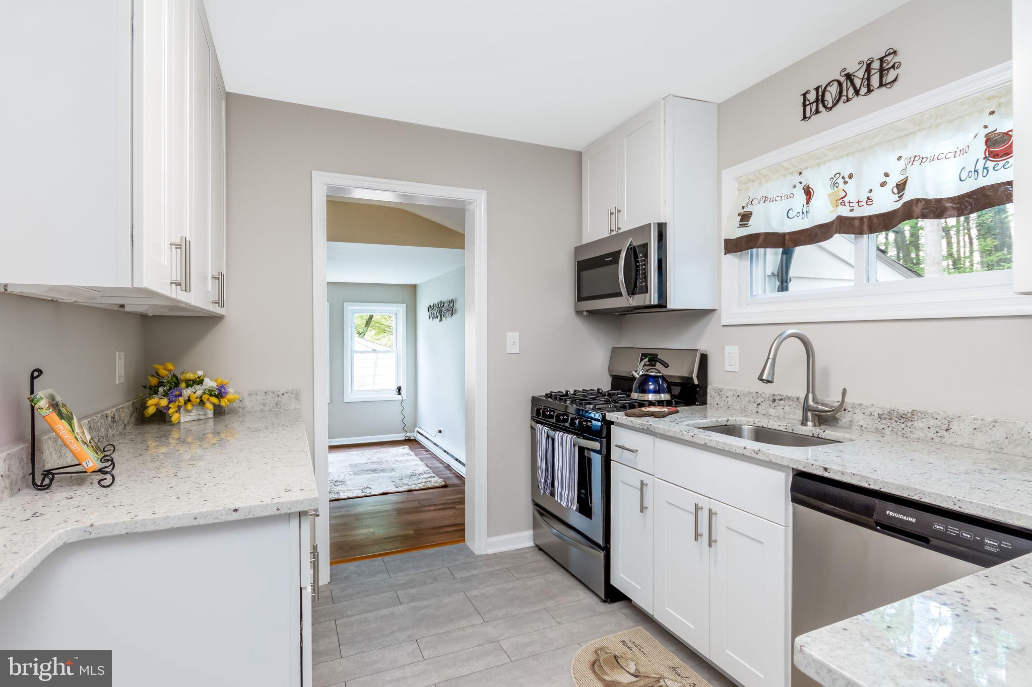 2477 Woodcroft Road Baltimore, MD 21234 - Photo 18 of 27 Kitchen to family room