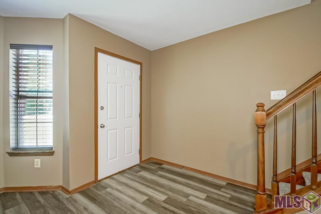 16382 Hooper Road, Unit A1 Greenwell Springs, LA 70739 - Photo 4 of 23 Front door from inside