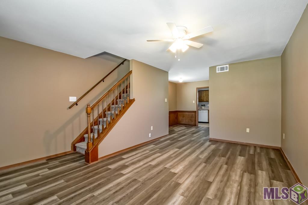 16382 Hooper Road, Unit A1 Greenwell Springs, LA 70739 - Photo 6 of 23 Looking in from bay window / living room