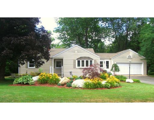 168 Birch Road Longmeadow, MA 01106 - Photo 1 of 13 a front view of a house with a garden
