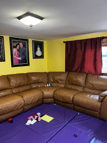 a living room with furniture and a couch