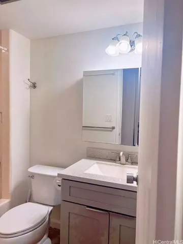 a bathroom with a sink and a toilet