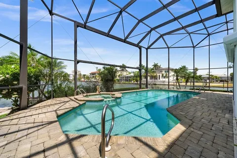 a view of a lake with a big yard