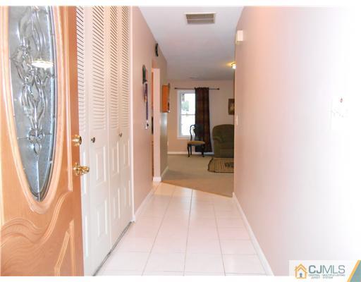 151 Woodbury Road Edison, NJ 08820 - Photo 12 of 15 a view of a bathroom with a tub and shower