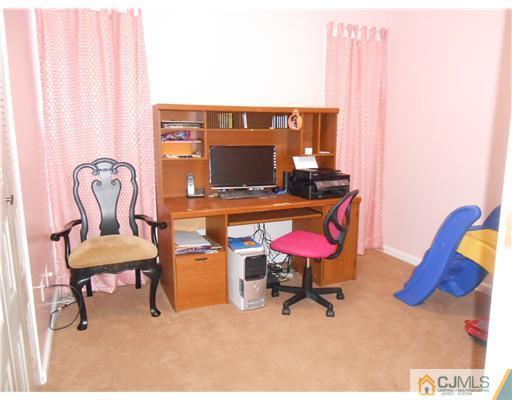 151 Woodbury Road Edison, NJ 08820 - Photo 6 of 15 a room with furniture and air hockey table