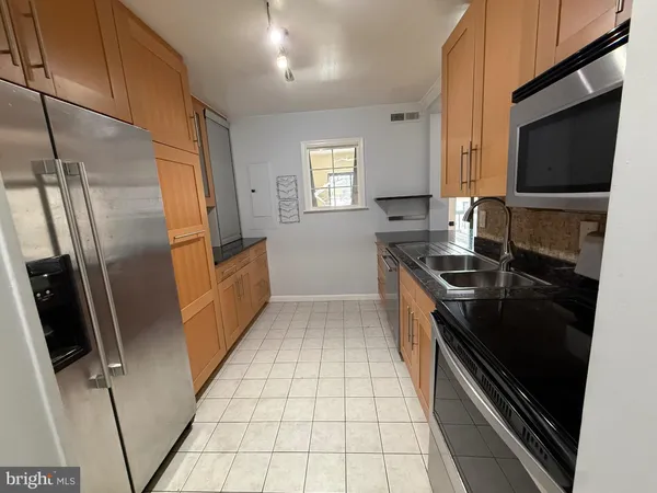 a view of kitchen with utility room