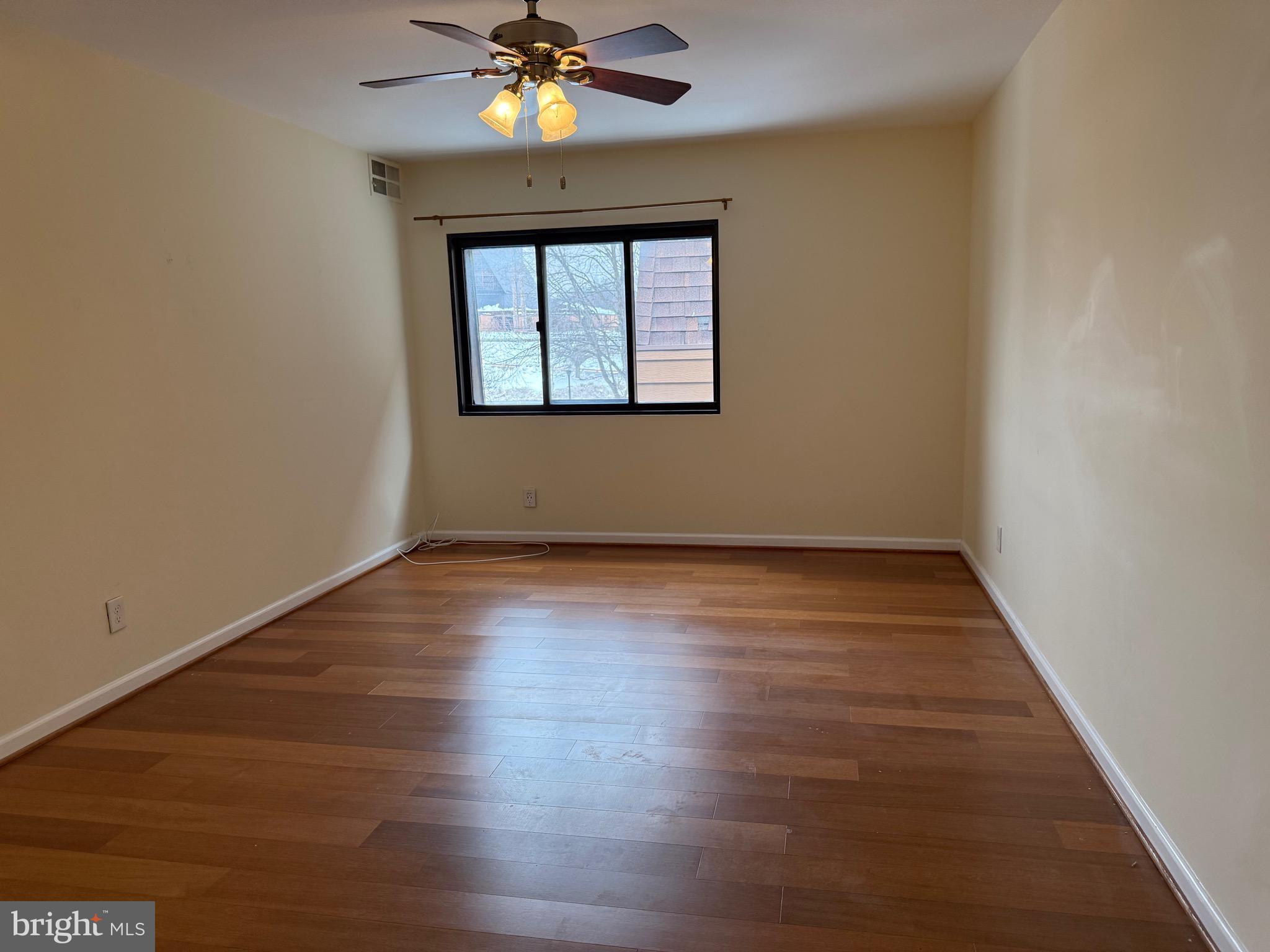 12702 Veirs Mill Road, Unit 51301 Rockville, MD 20853 - Photo 6 of 21 Primary bedroom with ceiling fan