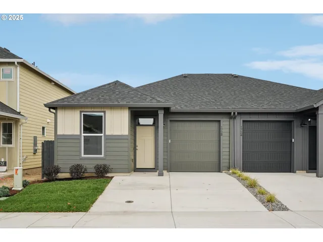 a house view with a backyard space