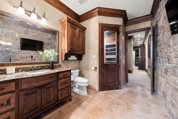 a view of a kitchen cabinets and a wooden floor